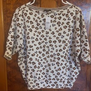 New with tags. Ann Taylor animal print short sleeve sweater. Size medium.